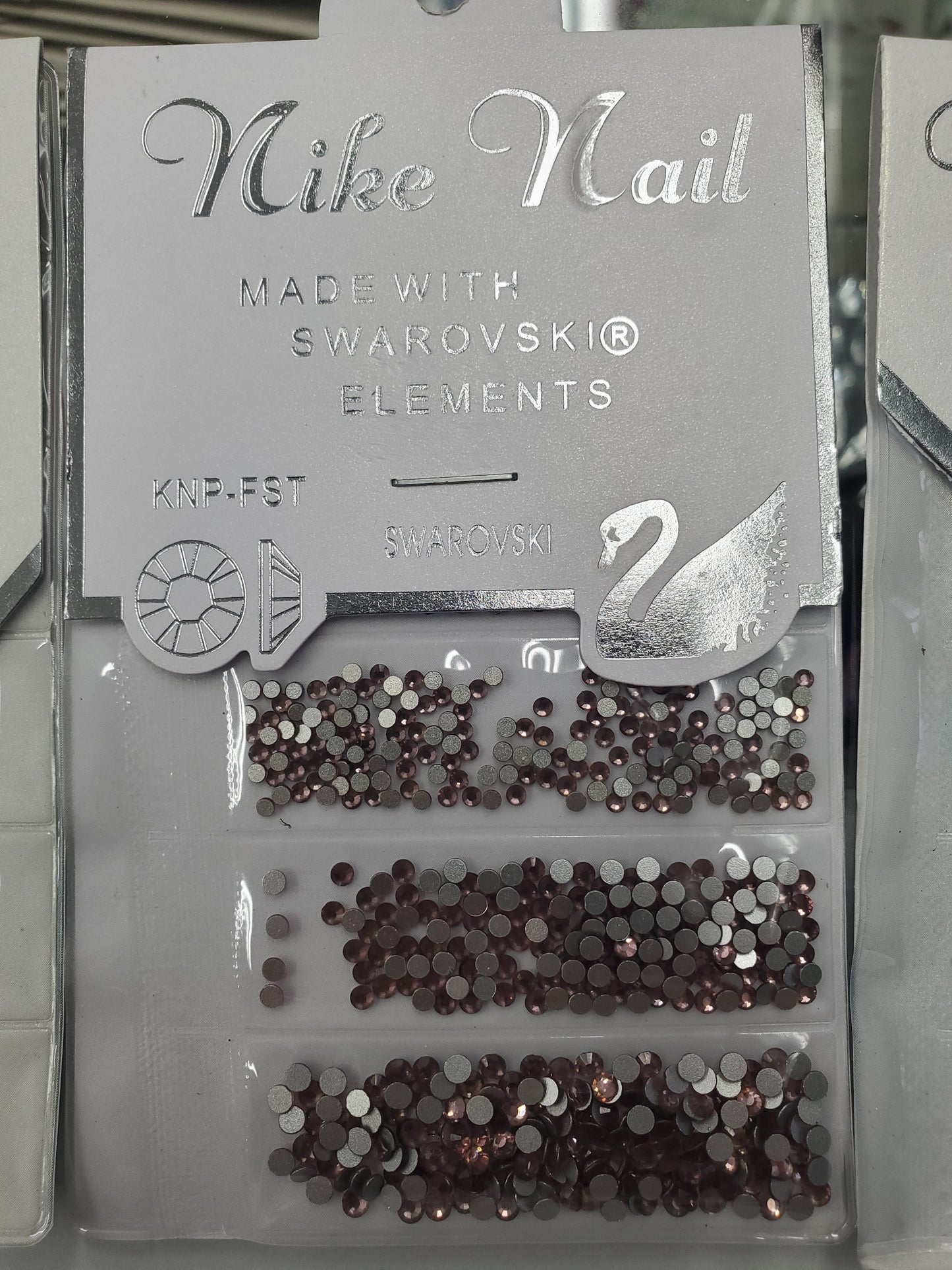 NIKE NAIL RHINESTONES