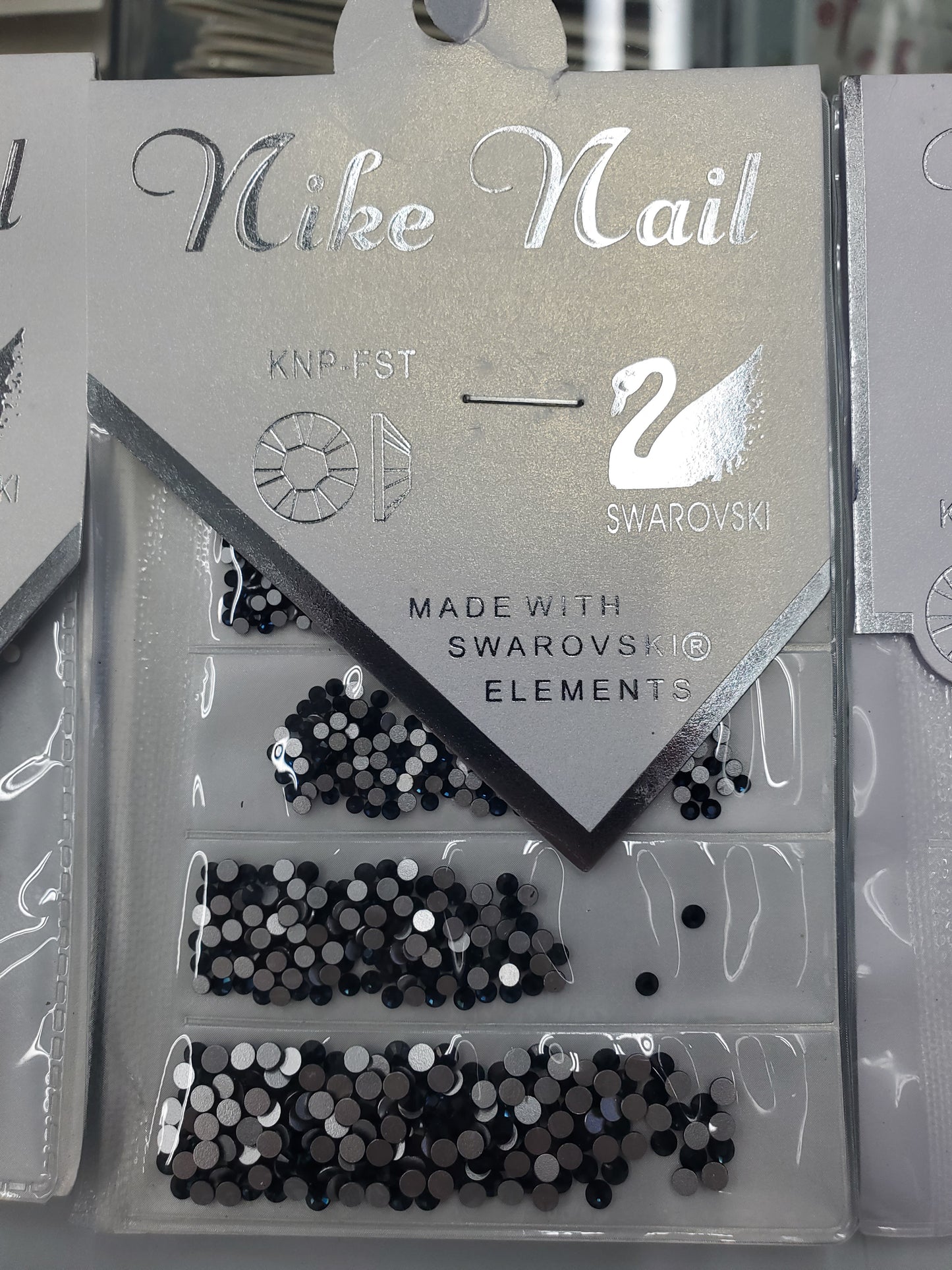 NIKE NAIL RHINESTONES